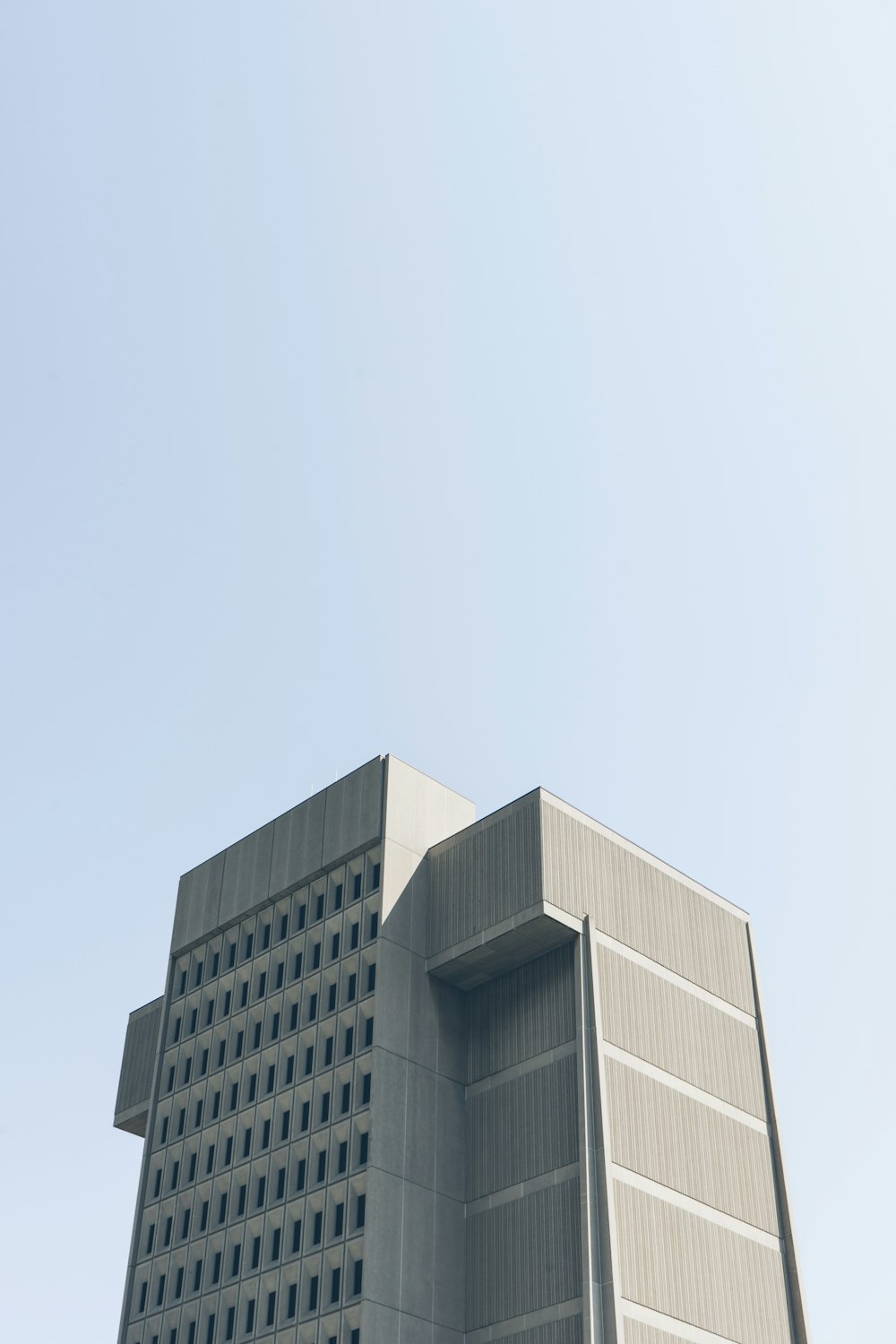 low angle photography of grey building
