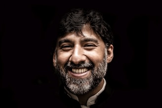 man wearing black and white top
