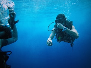 person scuba underwater