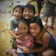 A happy family participating in a homeschool sports activity.