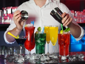 A vibrant cocktail bar setup with colorful drinks.