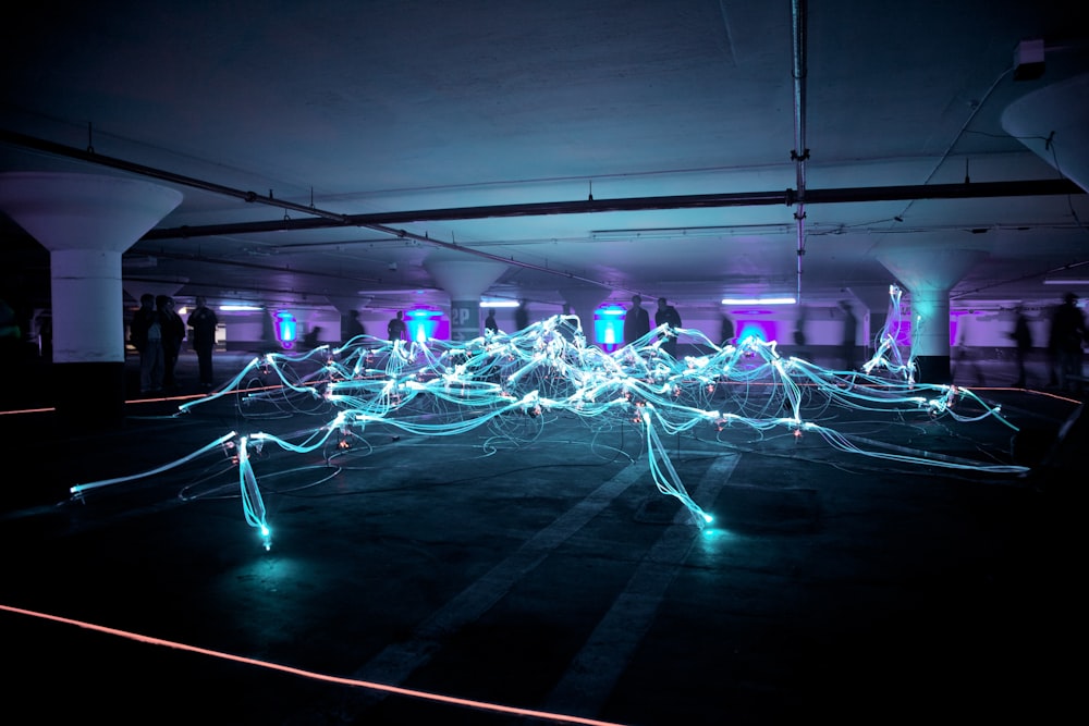 linked neon lights under white painted basement