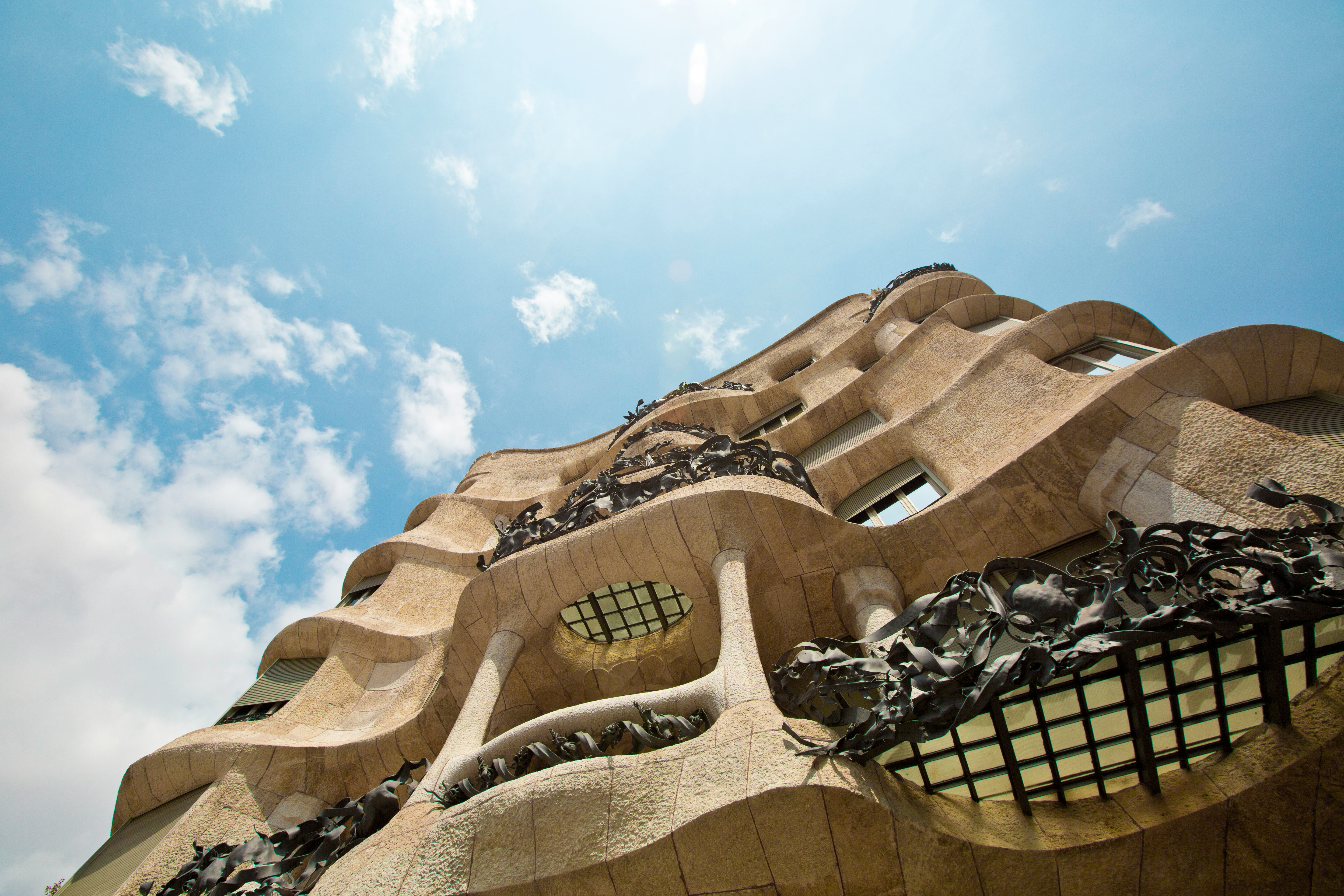 worms eye view photography of brown concrete structure