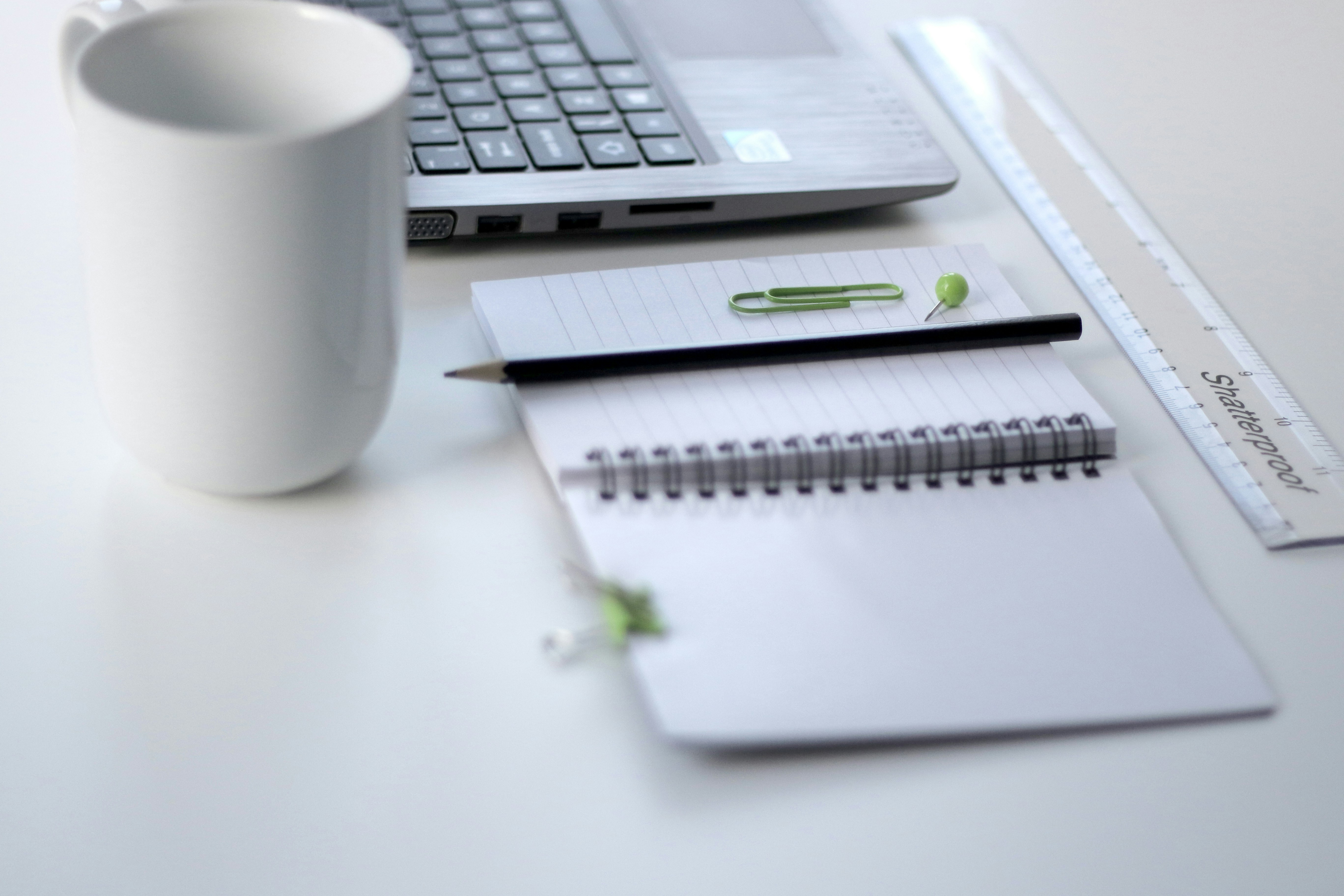 Ruler and laptop on a desk