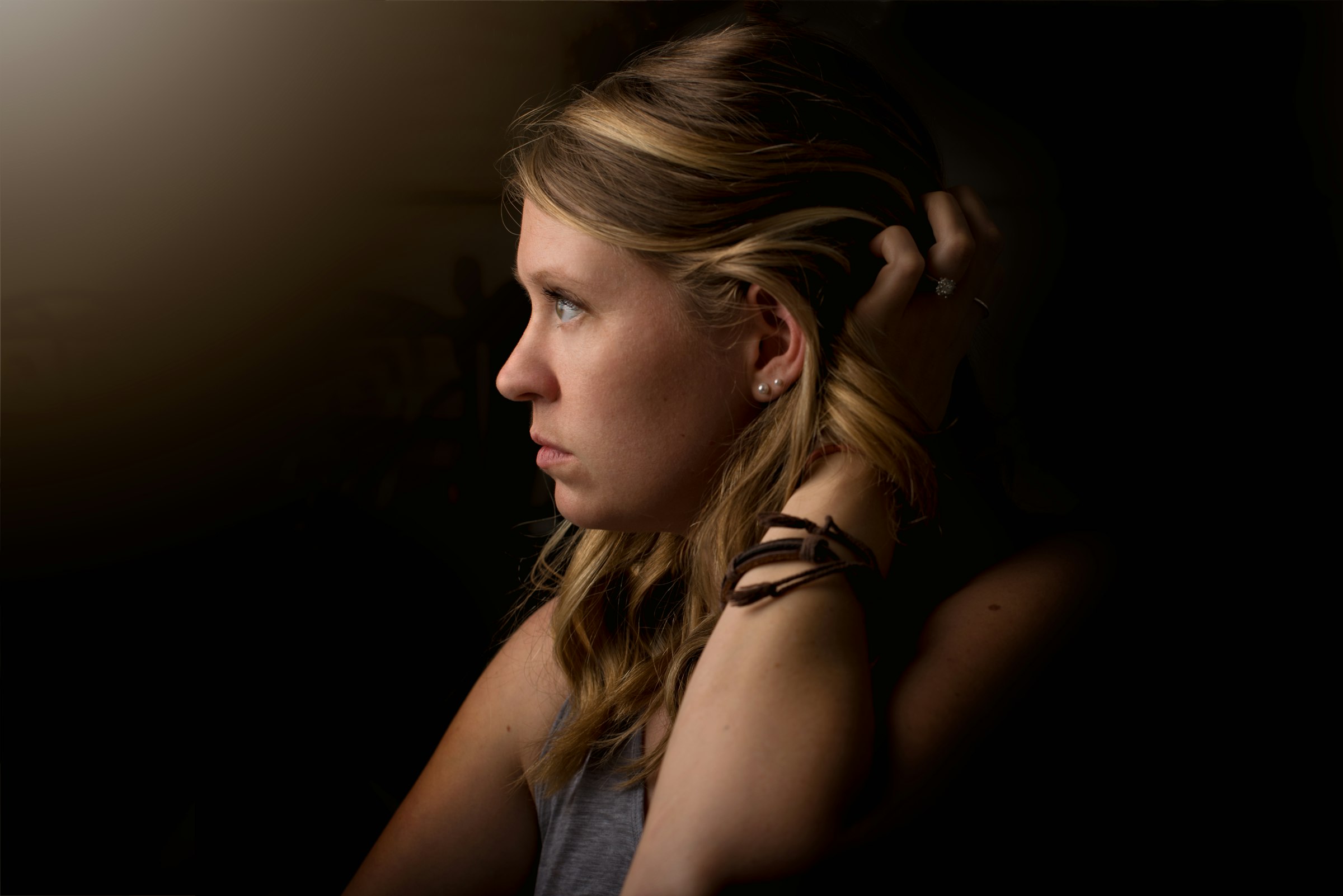 dramatic side lighting on a portrait subject showing light direction effects