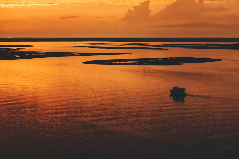 aerial photo of calm water near islands