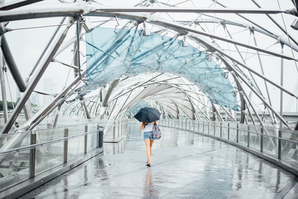 woman holding umbrella