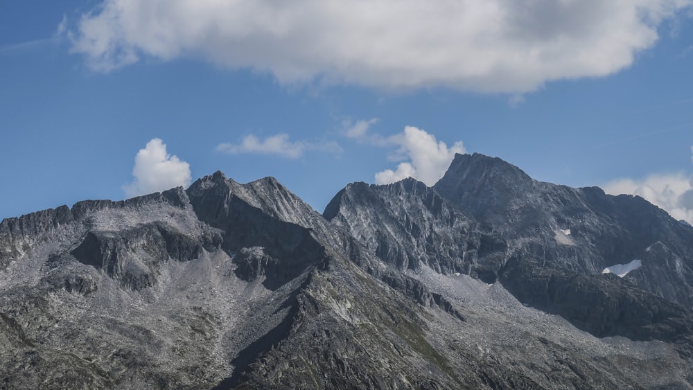 green and gray mountain under blue sky during daytime