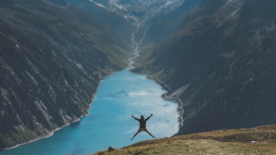 person jumping in Wasserkraftwerke im Zillertal Austria