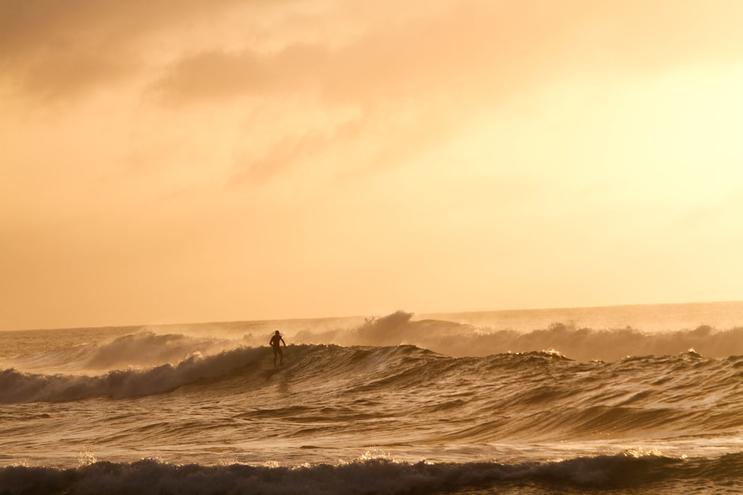 Large waves coming in during sunset.