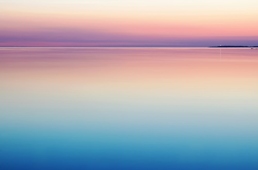 photo of blue and pink sea