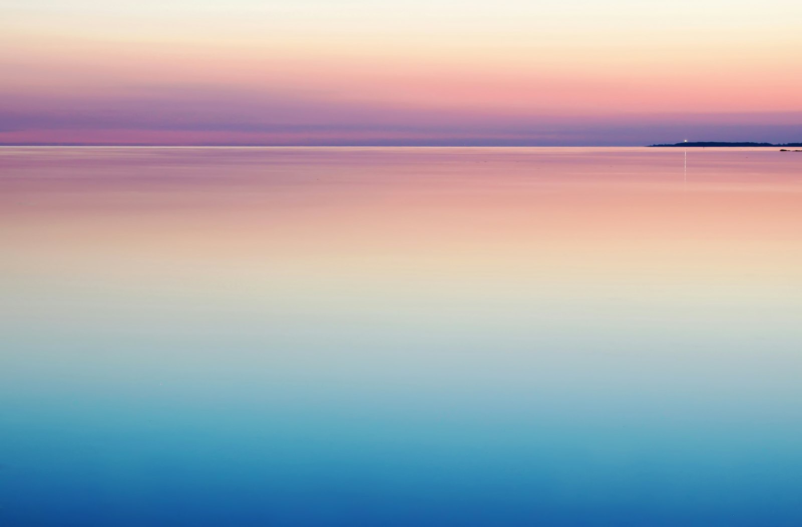 Calm ocean horizon in soft morning light