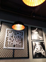 Customer’s cozy studio corner showcasing personalized custom-upload metal art pieces.