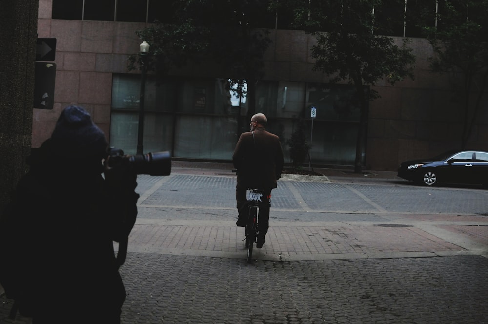 man riding bicycle