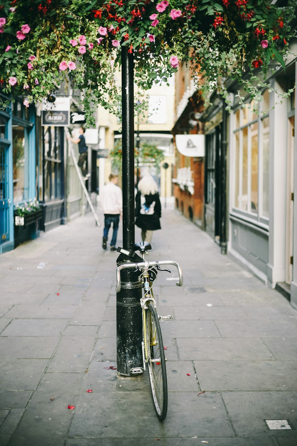 grey city bike near black street post