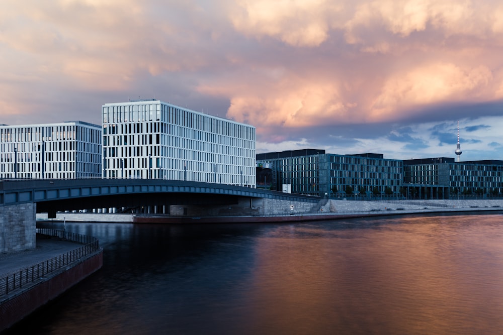 architectural photograph of structures near body of water