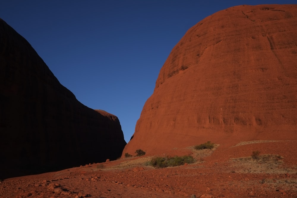 brown rock formation under blue sky during daytime