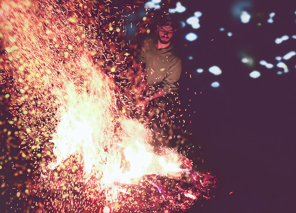 man near firewood