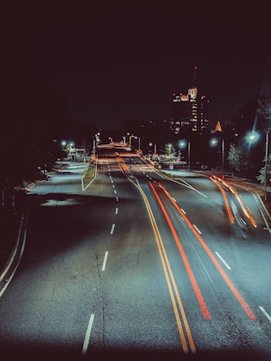 long exposure photography of road and cars