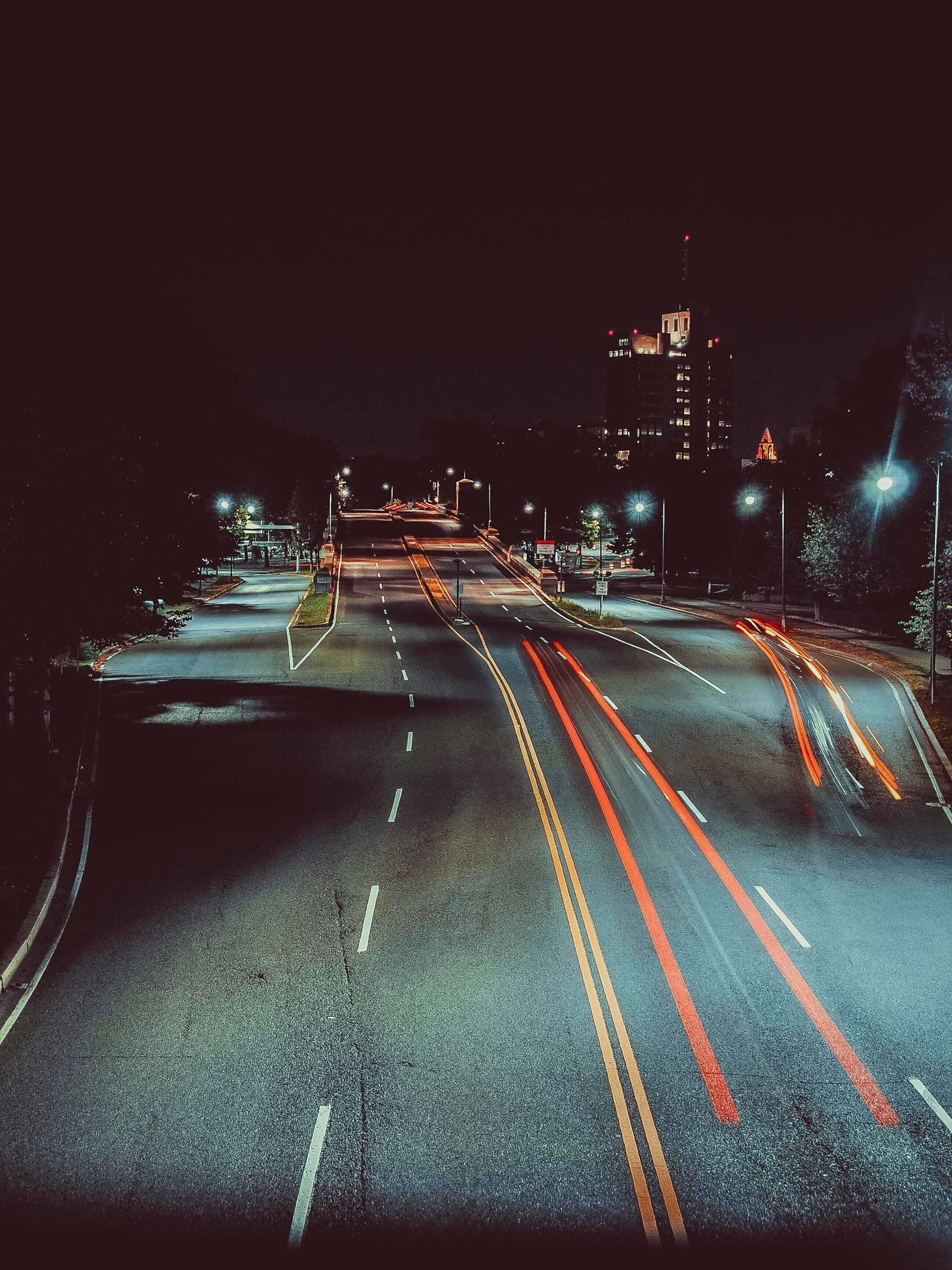 long exposure photography of road and cars