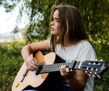 woman playing gitar