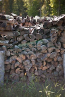 A large pile of esterilla materials neatly arranged outdoors under natural light.