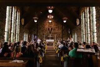 people sitting on chair in church