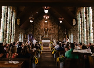 people sitting on chair in church