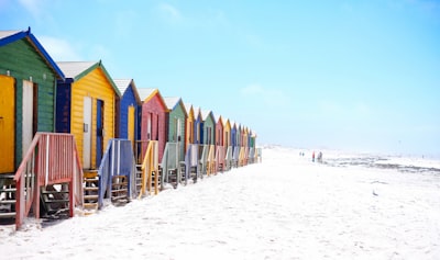 assorted-color beach houses cape town google meet background