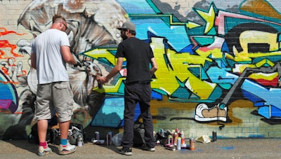 Diverse team members working on a reverse graffiti campaign.