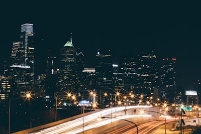 streetlights near buildings during daytime long exposure teams background