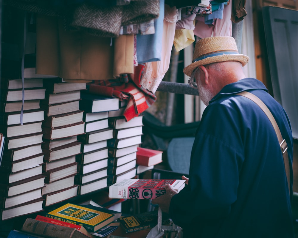 man holding book