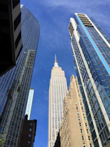 A clear view of Chicago's skyline with iconic buildings under a bright sky, no people visible.