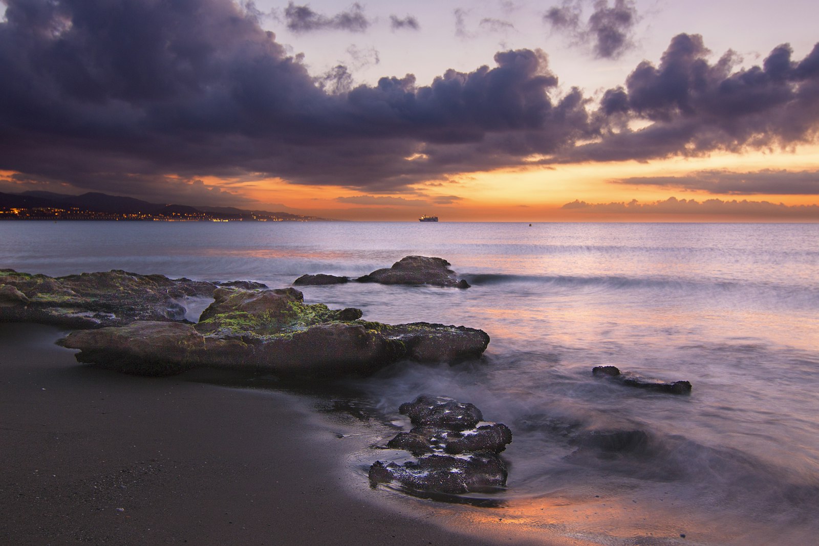 Canon EOS 50D sample photo. Seashore under cloudy sky photography