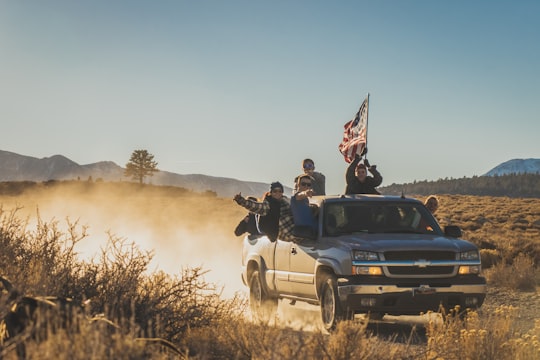 group of people riding silver Chevrolet extended cab in Mammoth Lakes United States