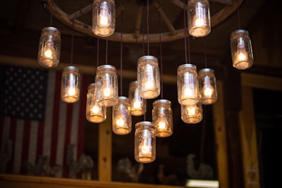 clear glass mason jar hanging lamp turned on knicks teams background