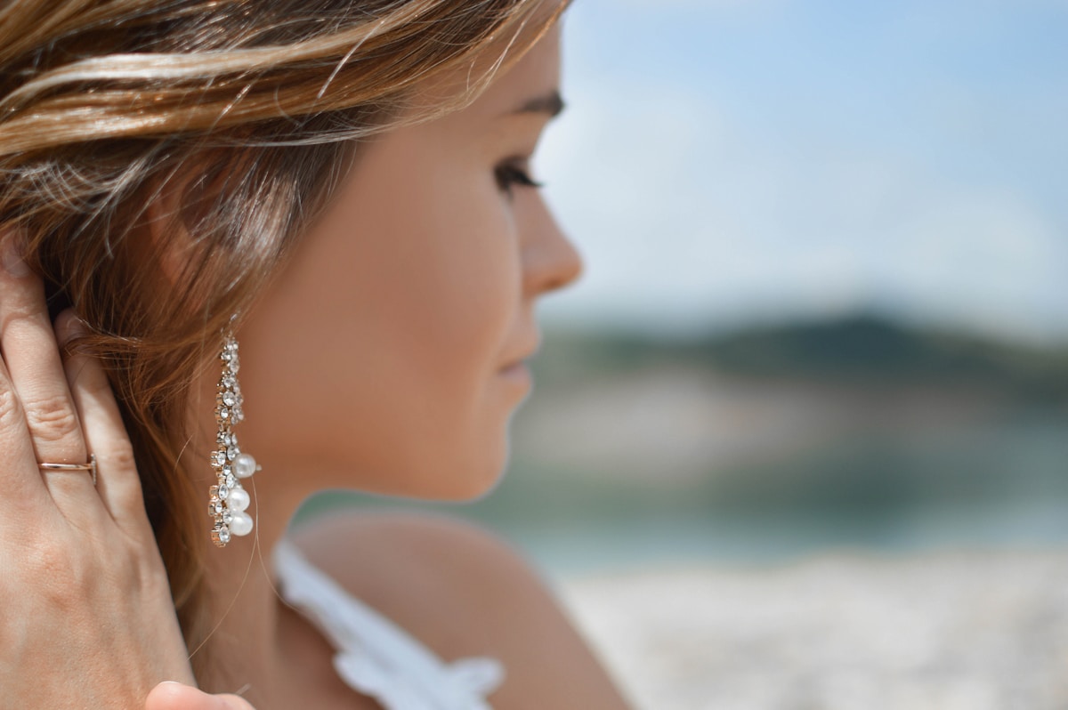 earings on a lady on the beach