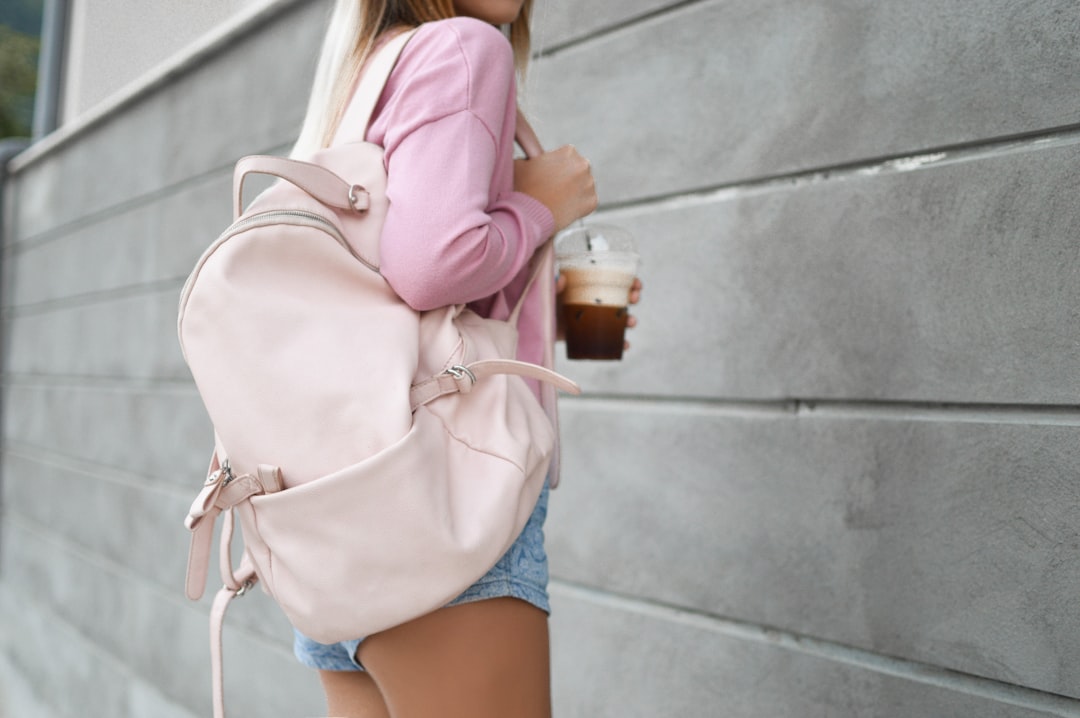 woman holding disposable cup, Read more: https://shinyhoney.com/blog-outfits-need-to-go.html