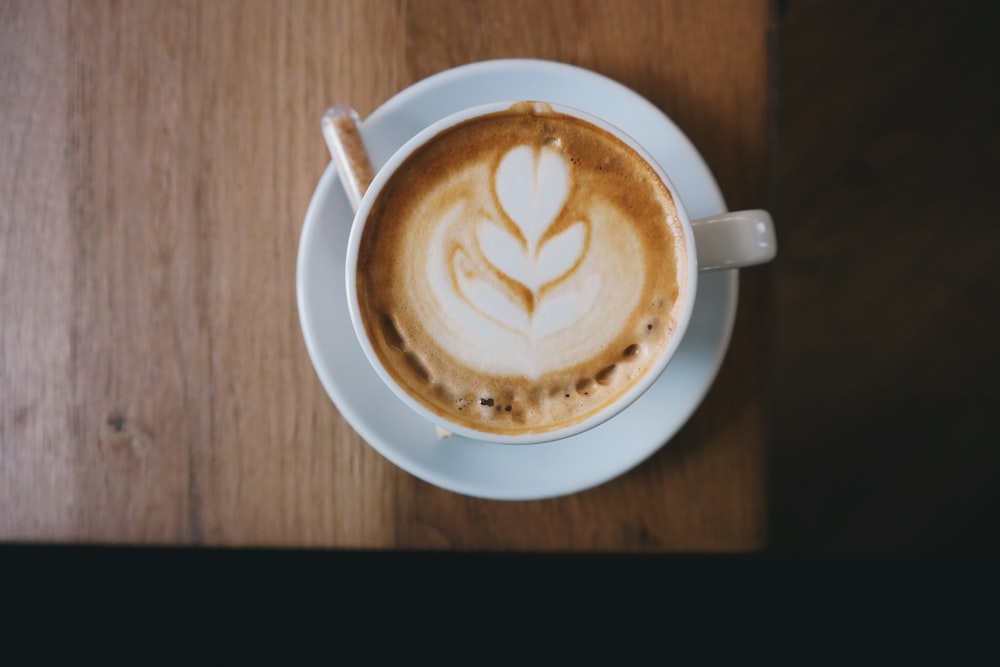 white ceramic cup with espresso coffee