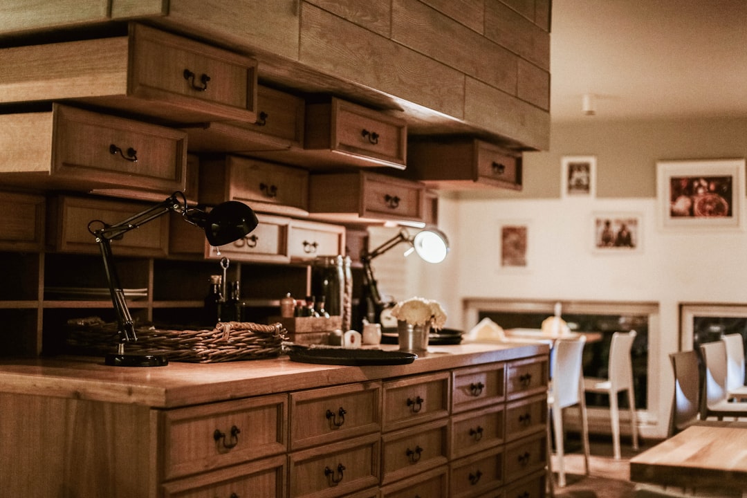 black and brown steam punk lamps on brown sideboard, Well Lit Workplace