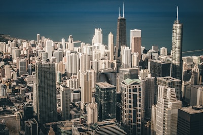 aerial view photography of city buildings near body of water