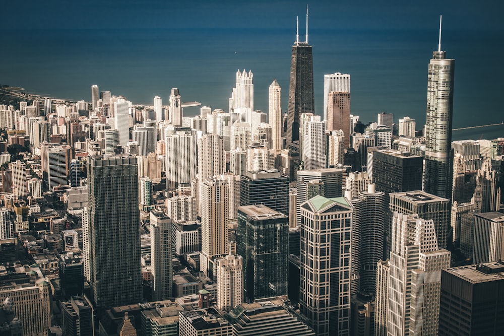 aerial view photography of city buildings near body of water