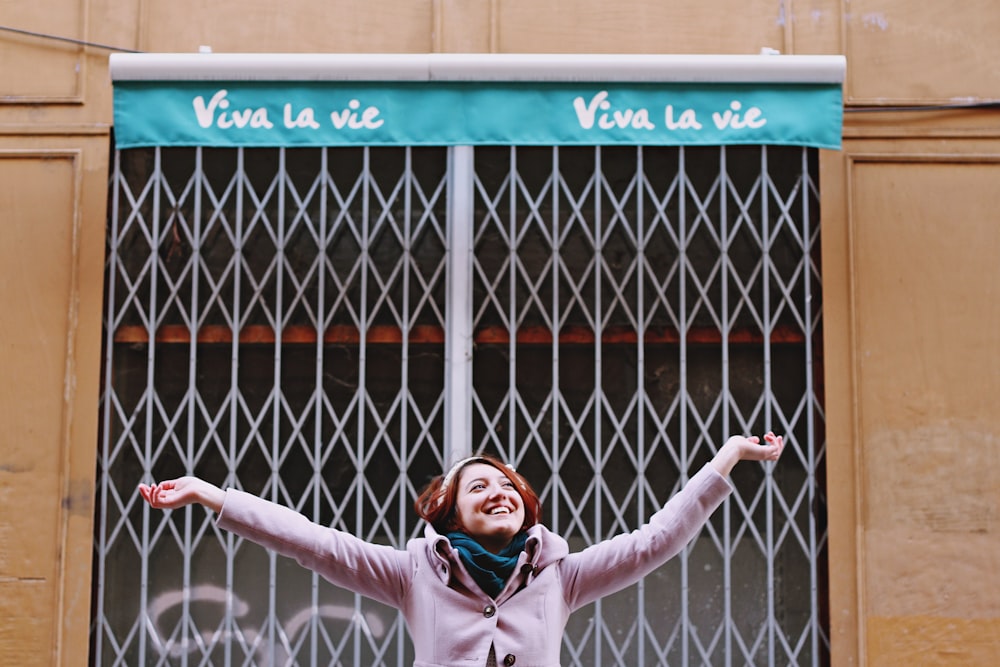 woman in front of scissor gate