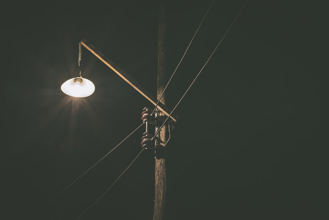 black utility pole lights turned-on