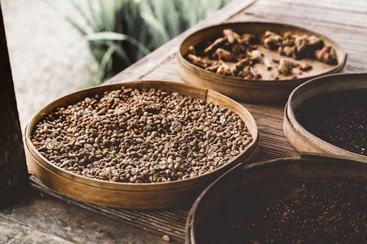Close-up of crispy, white makhana seeds neatly arranged in bamboo baskets.