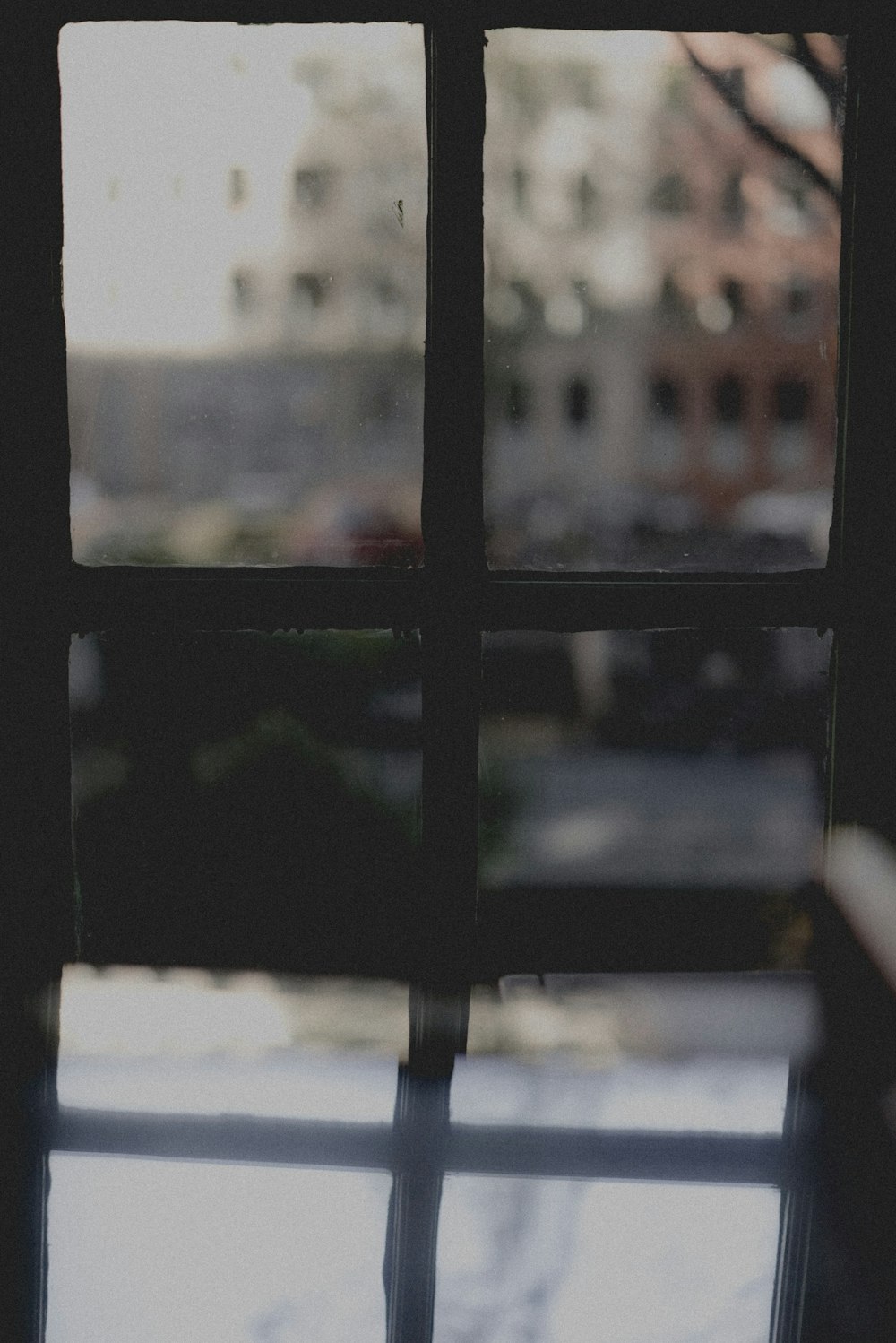 black framed glass 4-pane window