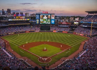 players and fans on baseball stadium