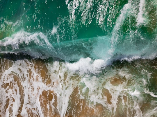 aerial photography of sea waves on seashore during daytime in Balboa Island United States