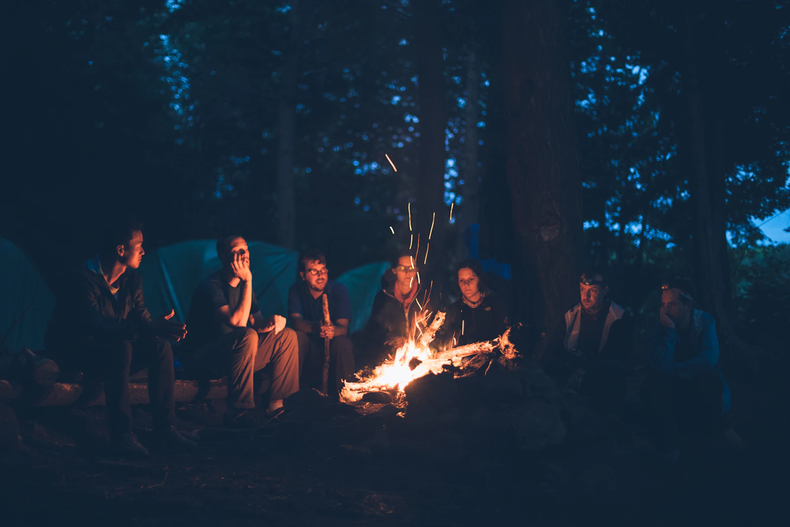 Campfire embers at night
