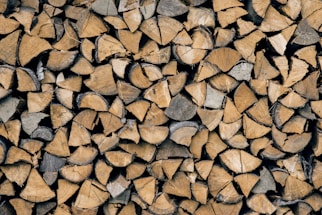 A cozy stack of premium firewood ready for delivery.